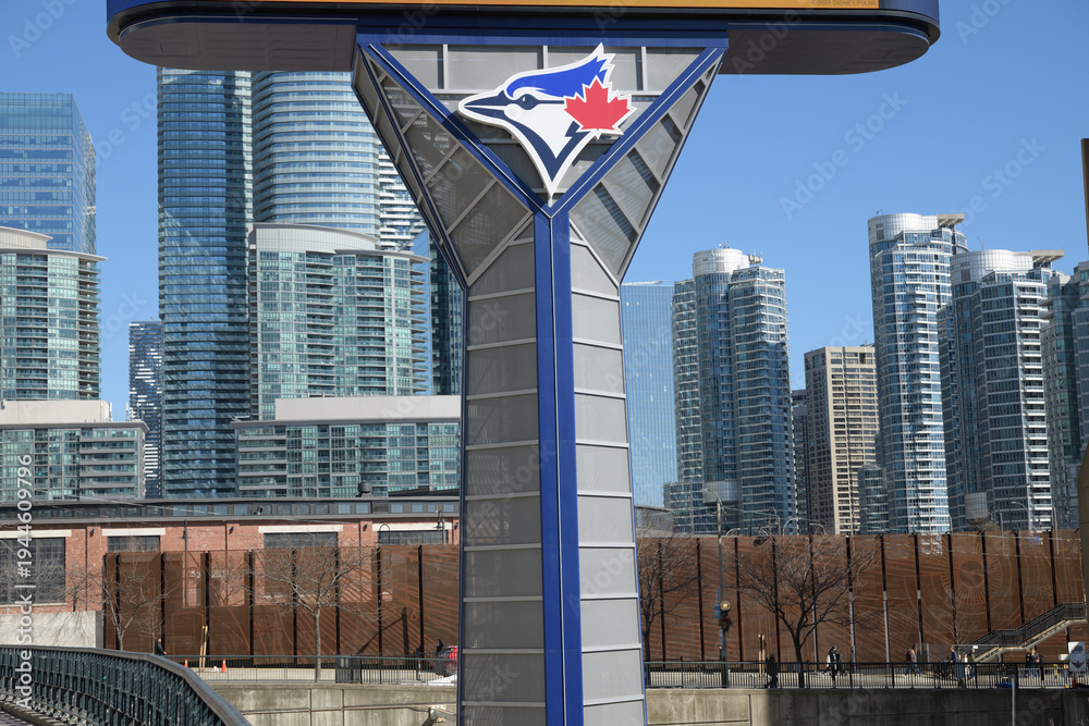Fototapeta premium Rogers Centre Gardiner LED pylon sign structure with Toronto Blue Jays logo (west facing side) at Rees St and Bremner Blvd