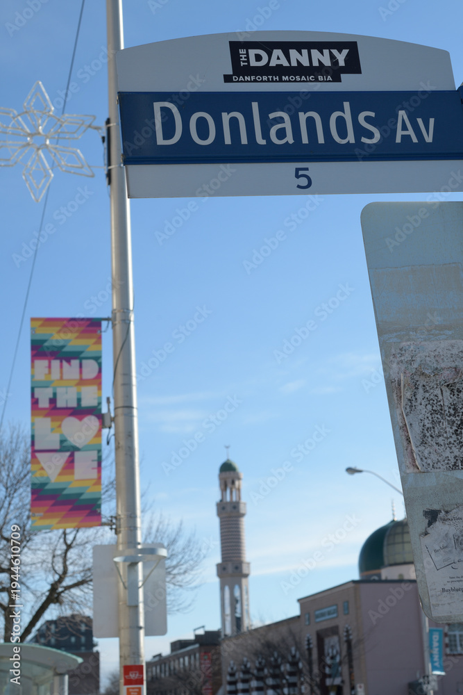 Fototapeta premium City of Toronto street sign at Donlands Av with BIA Banner 