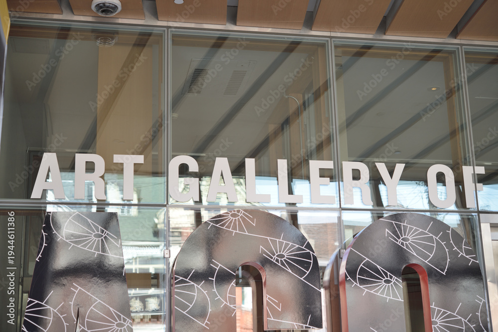 Fototapeta premium detail of window and physical 3d signs in front of the Art Gallery of Ontario, 317 Dundas St W, Toronto