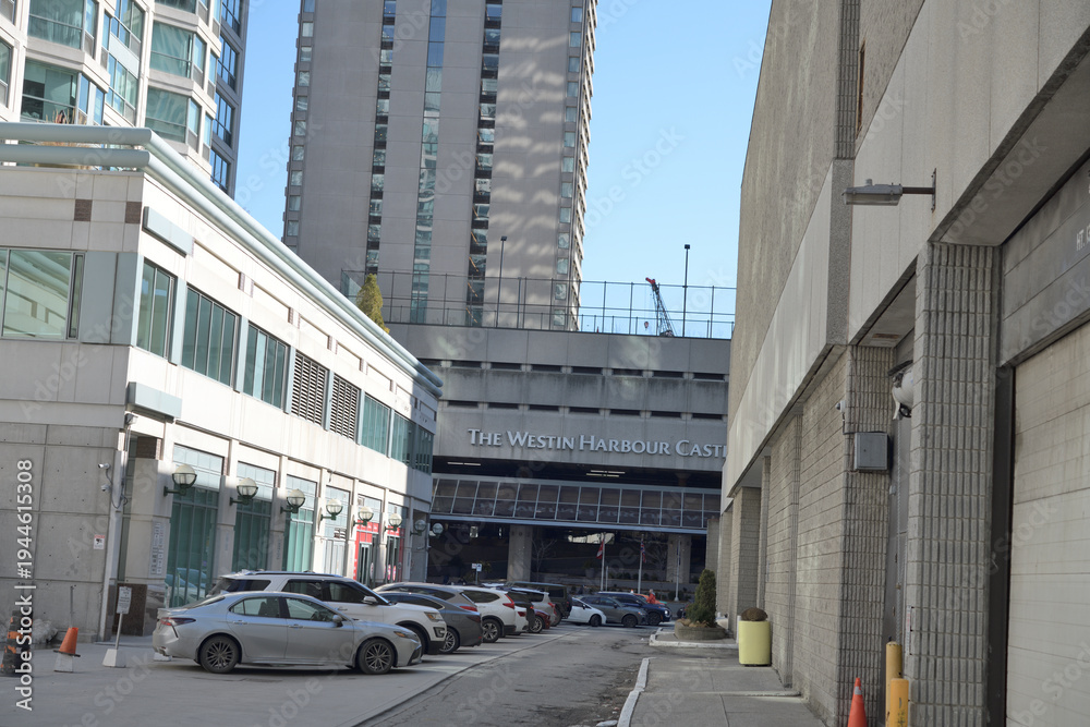 Fototapeta premium looking south on access route to The Westin Harbour Castle sign facing Queens Quay W, Toronto