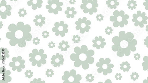 Seamless pattern design with simple light green floral blossoms of various sizes scattered over a white background.