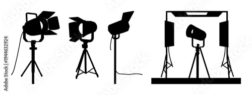 Spotlights set with solid black silhouette of a vintage theatrical spotlight on a stand featuring film noir, precise edges, white background with black silhouette and spotlight