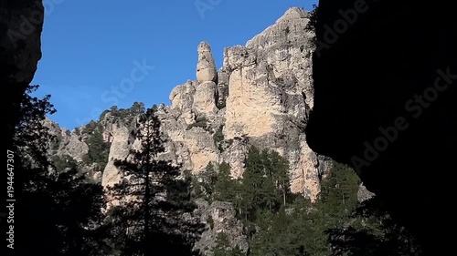 rocks and vertical mountain in canyon
