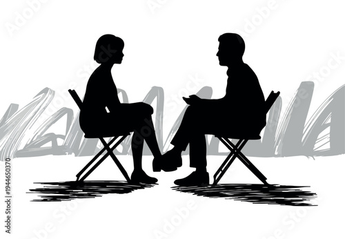 Two silhouetted people sitting opposite each other engaged in a serious conversation or discussion