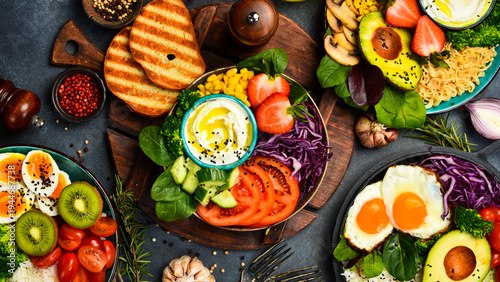 vegan, detox Buddha bowl with tomatoes, cabbage, corn and cheese. Diet food concept.