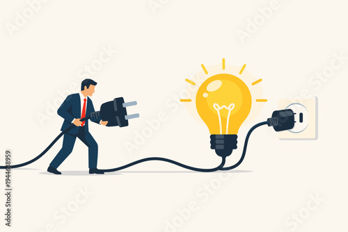 Businessman in a suit holding a large electrical plug to power a glowing light bulb, representing innovation, creative business solutions, energy, inspiration, and starting a successful project.