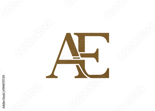Stylized initial letters ae in metallic gold on black background