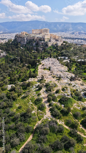 Aerial drone portrait photo of iconic Areopagus hill with great views to Acropolis and The Parthenon, Athens historic centre, Atttica, Greece