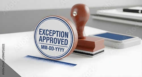 Wooden rubber stamp featuring exception approved message resting near blue ink pad on clean white office surface