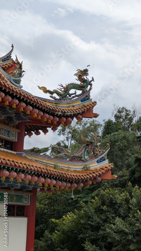 Photography Colourful chinese temple interior in Kuala Lumpur Malaysia with ornate gold budd