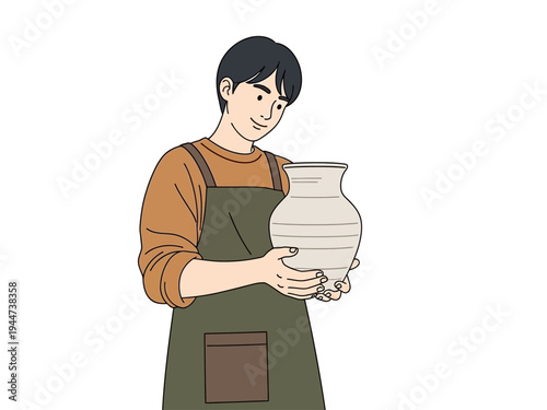 Man holding a handmade ceramic vase with pride.
