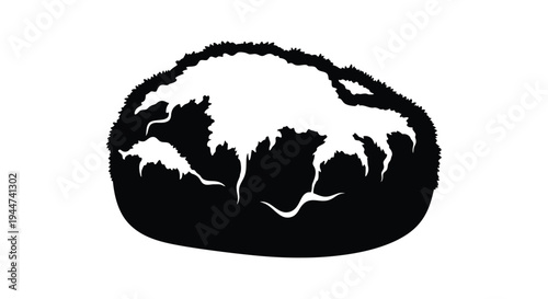 A striking black silhouette of a bear head and shoulders visible silhouette