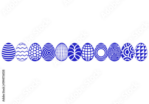 Row of blue dyed easter eggs on white background