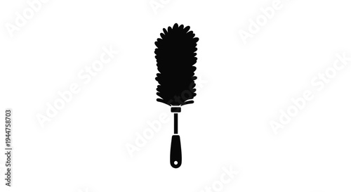 A black feather duster shown in a striking dark silhouette