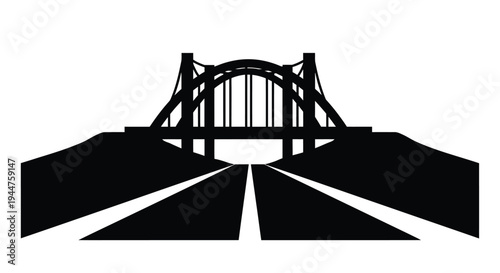 A striking black silhouette of a bridge and roadway landscape