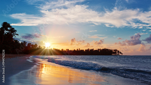 Paradise beach sunset landscape with tropical palm trees silhouettes.