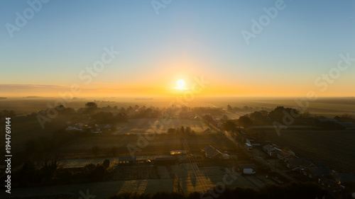 Rural farmland and English village town, Lincolnshire. Sunset in the countryside
