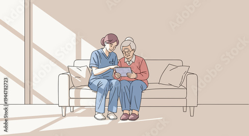 Two women looking at a tablet.