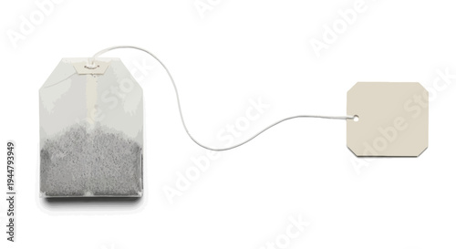 A single unbrewed tea bag with a string and blank label tag, poised and ready for making a comforting hot beverage, isolated on a clean white background
