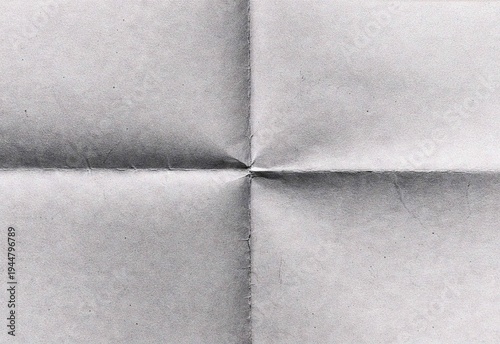 Bild auf Leinwand Close-up of folded gray paper with center cross crease and vintage texture