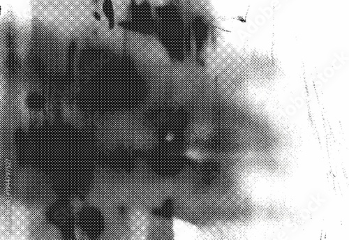 Black and white halftone dot texture with distressed vintage newspaper pattern