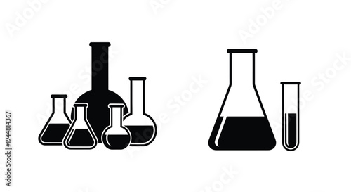 Collection of laboratory glassware in a stark black silhouette
