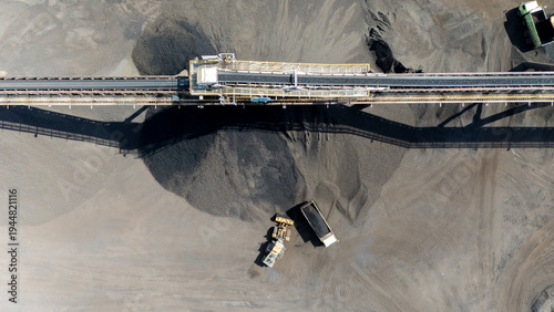 Bild auf Leinwand Drone footage from a coal mining site in South Kalimantan shows trucks and heavy