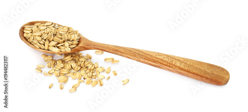 Oat flakes in wooden spoon isolated on white