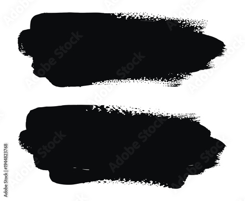 Two black ink brushstrokes on a white background
