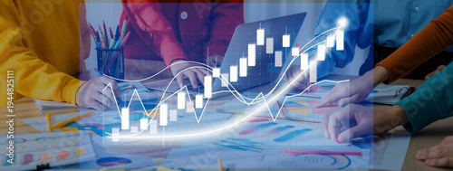 Bilde på lerret A diverse business team collaborates on market analysis with charts and graphs