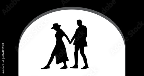 A romantic couple walks hand in hand through a tunnel
