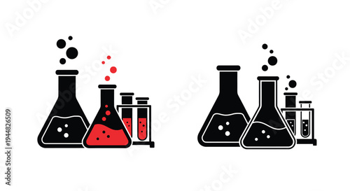 Laboratory glassware with bubbling liquids a stark black silhouette