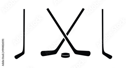 Two hockey sticks and a puck presented as a dark silhouette