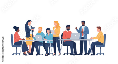 Business colleagues gathered around meeting table with laptops