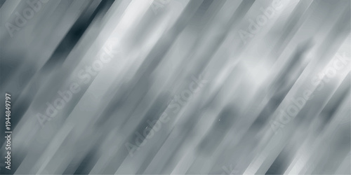 Smooth abstract background with blurred diagonal streaks of gray and dark blue creating a sense of motion and depth for modern design and technology themes
