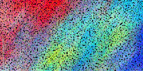 Dotted abstract background with a vibrant rainbow color spectrum of red green blue and yellow dots on a black canvas creating a stippled textured effect