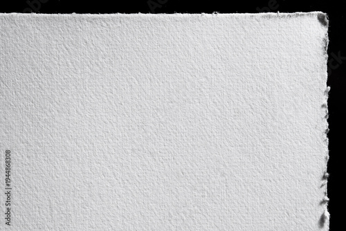 Tableau sur toile White Watercolor Paper Corner on Black Background