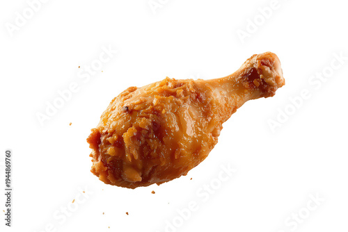 Crispy fried chicken drumstick floating on transparent background, a common fast food menu item