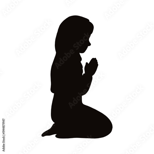 Silhouette of a Young Girl Kneeling in Prayer