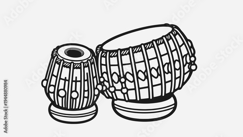Monochrome line art vector illustration of a traditional Indian tabla drum set, often played alongside a dholak, perfect for classical music and cultural festival designs.
