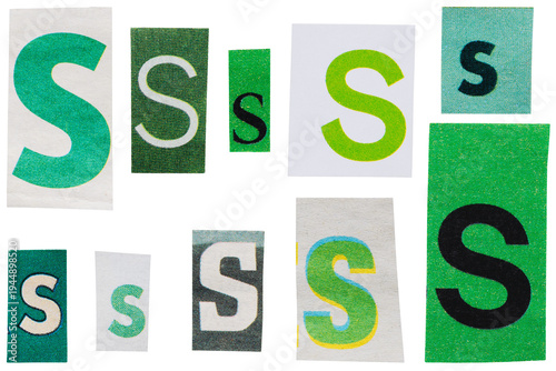 Set of green ransom letters S cut out from vintage newspapers and magazines isolated for collage