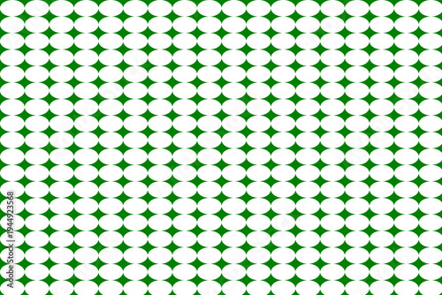 White circle repeating pattern with green background.