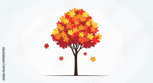 Colorful tree with falling leaves.