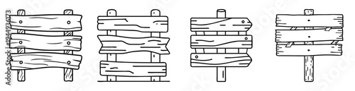 Four unique wooden signboards with black outlines for various directions and messages