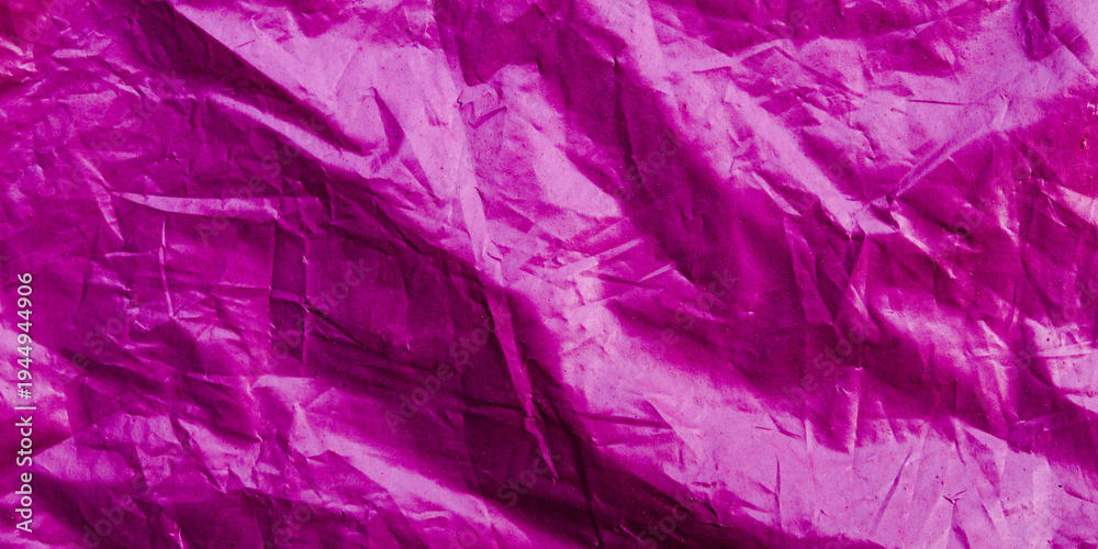 Naklejka premium Crinkled pink plastic sheet background texture