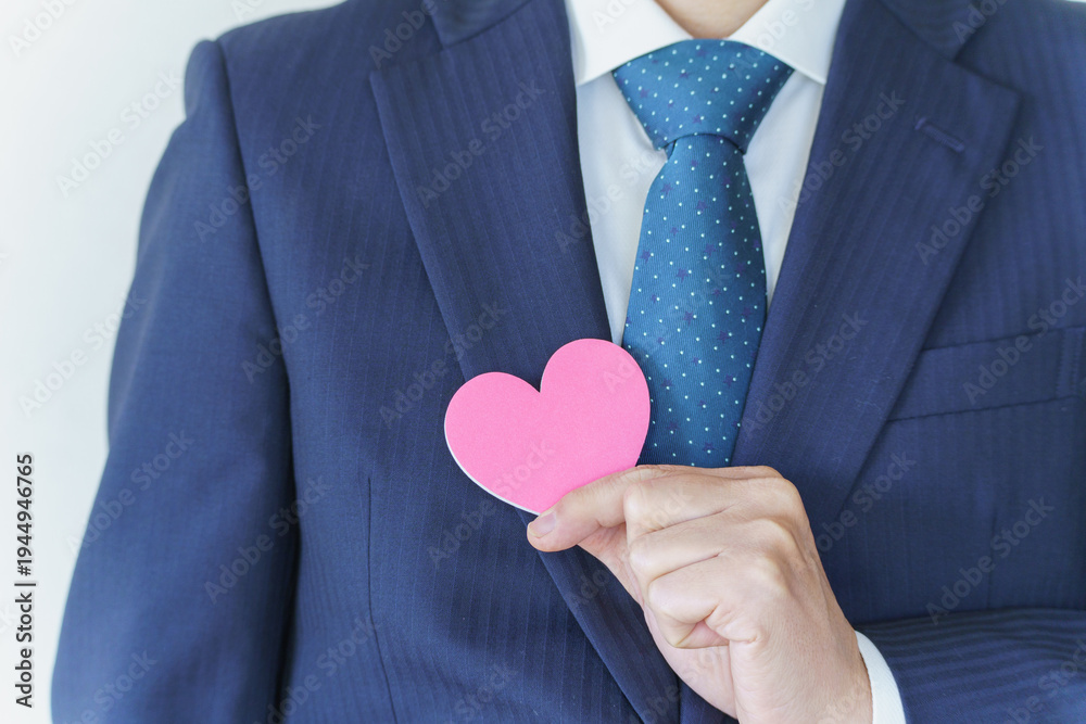 Fototapeta premium ハートとスーツの男性