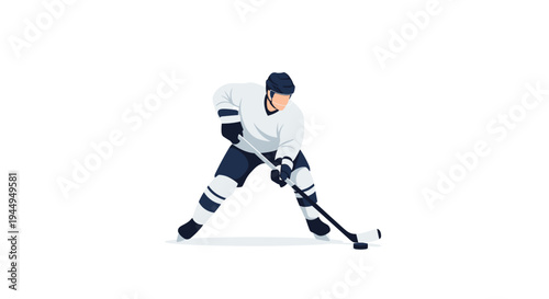 A male ice hockey player in a white and dark blue uniform is poised to hit a black puck with his stick on a clean white surface.