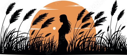 Silhouette of woman in grass with large sunset behind her pampas grass nature evening sky warm tones
