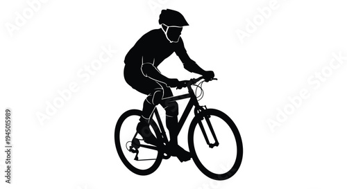Silhouette of a cyclist riding a mountain bike outdoors