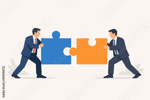 Professional businessmen in suits connecting large blue and orange puzzle pieces, symbolizing successful collaboration, corporate partnership, teamwork, strategic synergy, and problem solving.